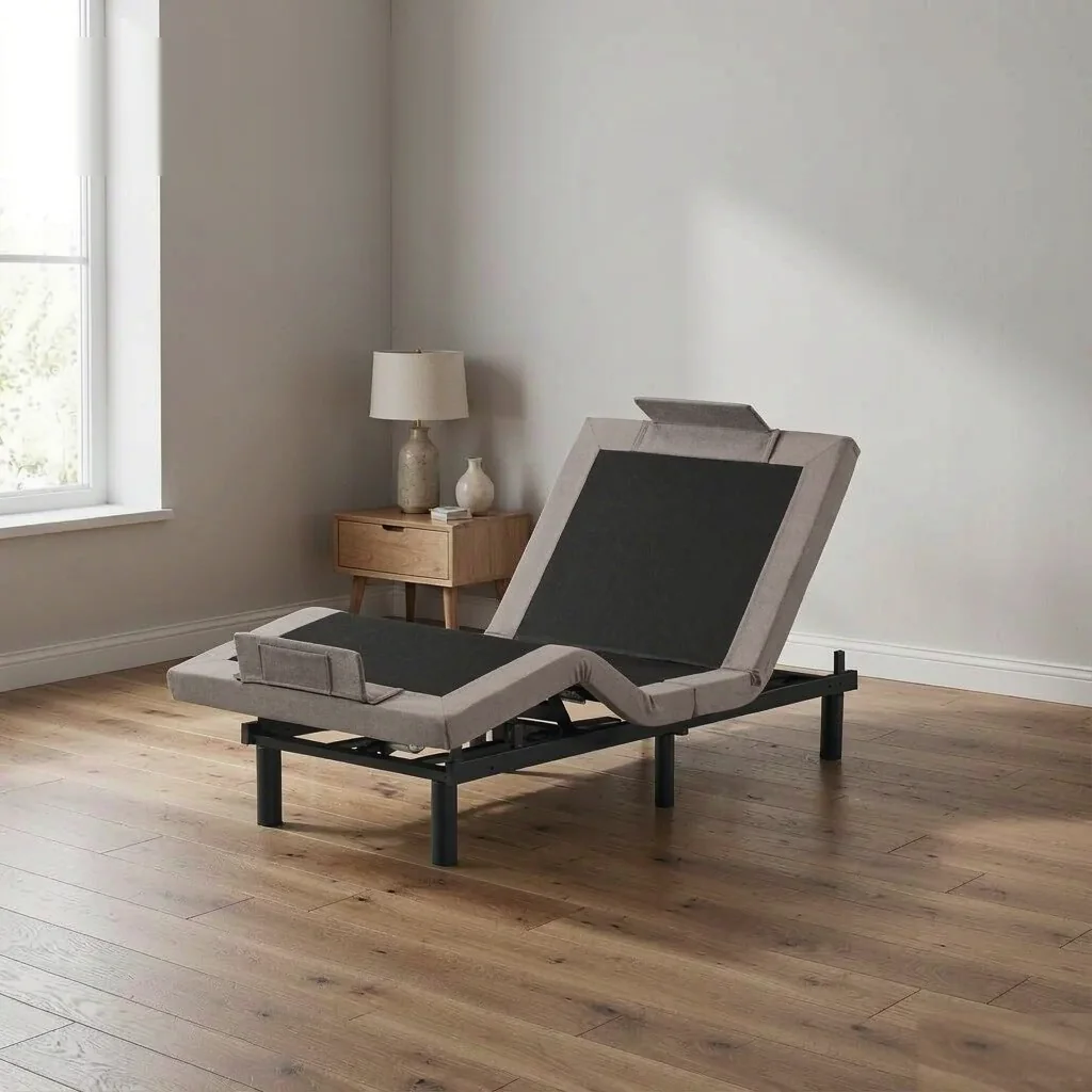 KD010-A2 taupe upholstered adjustable bed base with black deck panels in a modern bedroom
