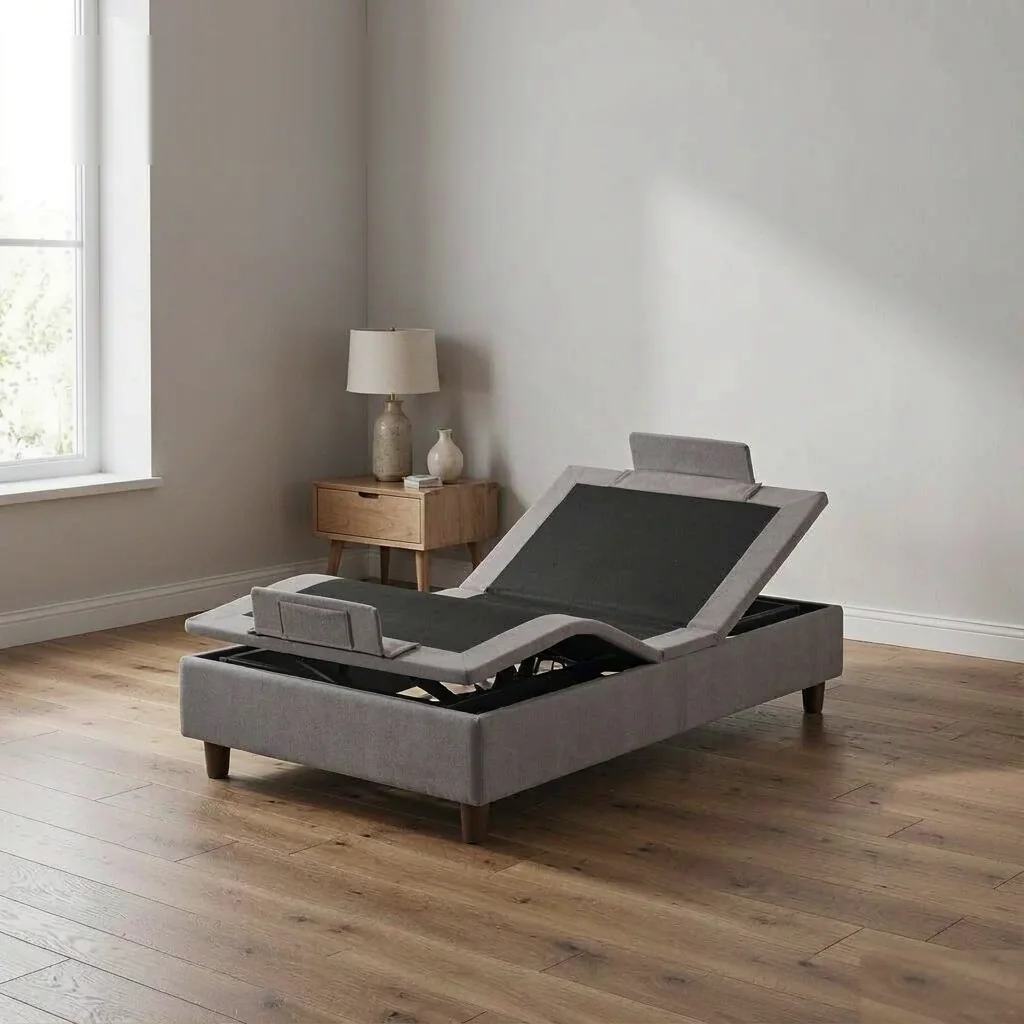 KD011-A3 grey fabric wrapped adjustable bed base with raised head section in a modern bedroom